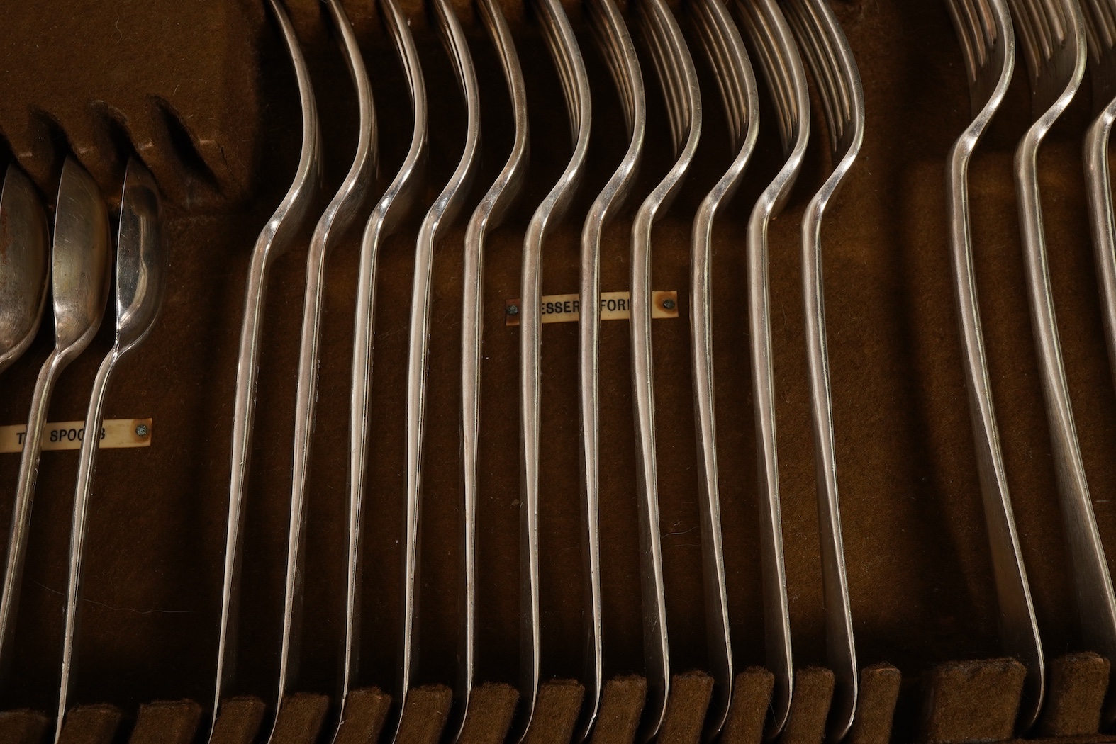 A George V canteen of silver Hanoverian rat tail flatware, by Mappin & Webb